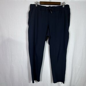 Lululemon On The Fly Woven 27" True Navy Crop Pull On Pants Womens 12 Athleisure